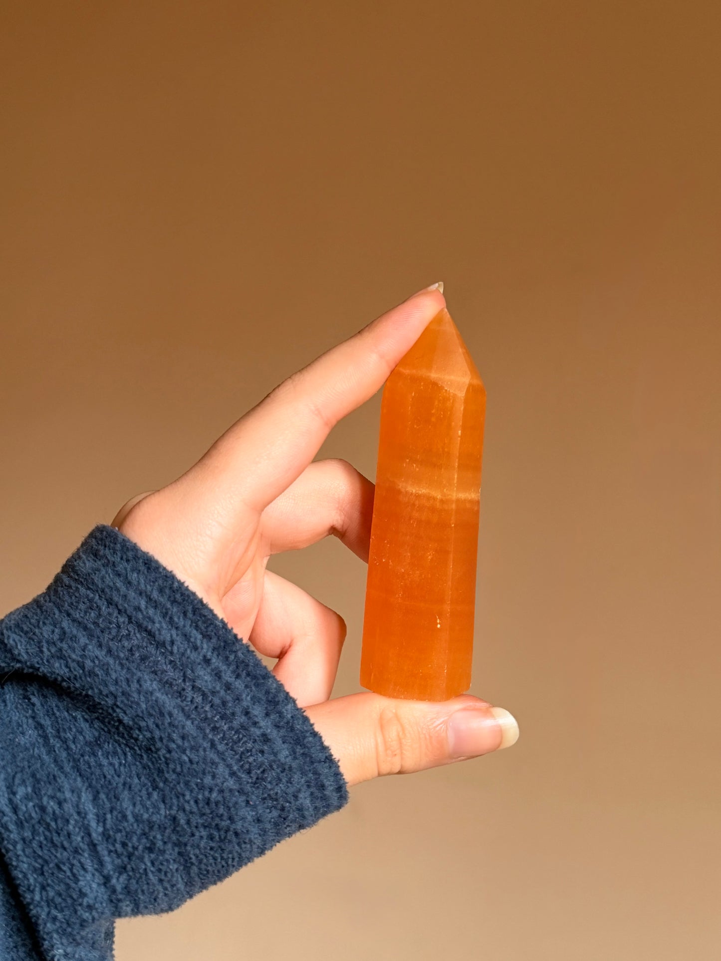 Torre in calcite arancione